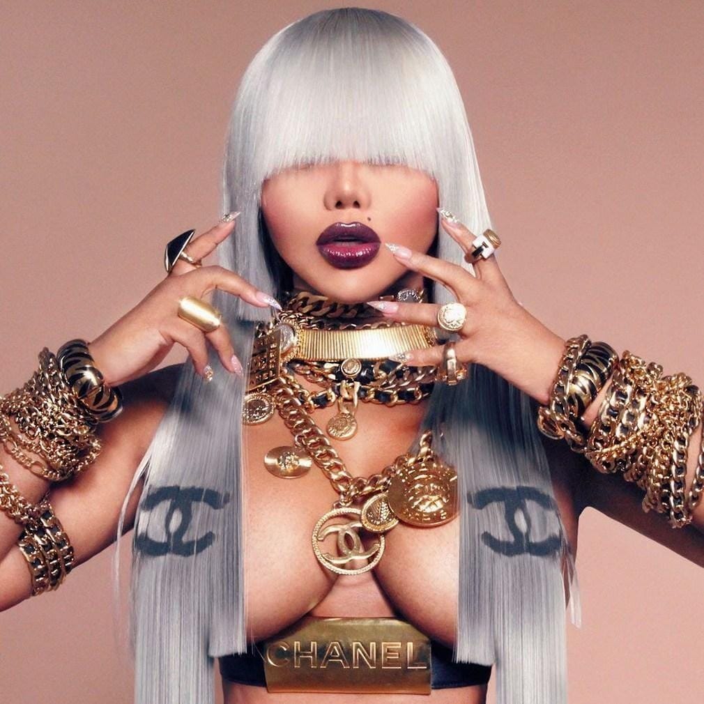 Lil’ Kim «9»